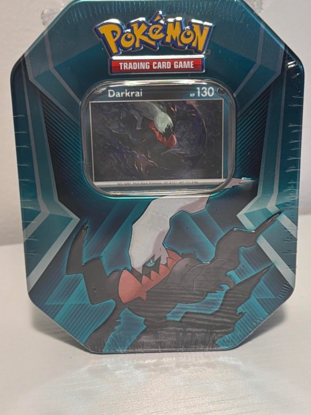Pokemon TCG: Triple Whammy Tin- Darkrai foil card pack